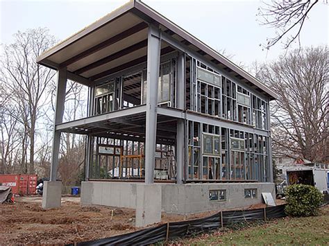 completed metal frame house|steel frame residential home construction.